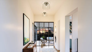 A hallway in a home beautifully illuminated by the Urban Ambiance UHP4159 Traditional Ceiling Light.