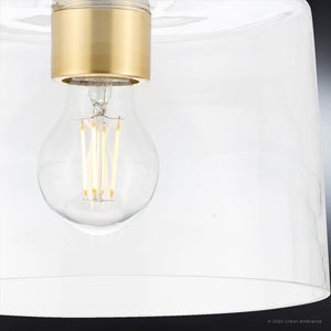 A luxury lighting fixture from the Esperance Collection by Urban Ambiance, featuring a unique UHP4160 Traditional Ceiling Light with clear glass shade and gold bulb.