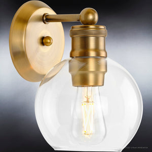 A beautiful Vintage Wall Sconce, 9.5''H x 6.5''W, Olde Brass Finish, Belfast Collection with a clear glass globe by Urban Ambiance.