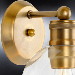 An UHP4170 Vintage Wall Sconce with a clear glass bulb that is unique and beautiful.