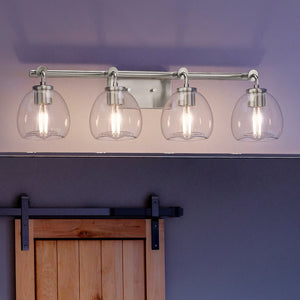 A unique Urban Ambiance UHP4183 Industrial Bath Light with beautiful glass shades and a barn door.