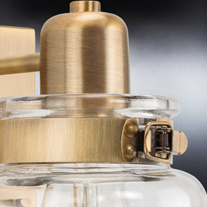A beautiful UHP4190 Vintage Wall Sconce 8.625''H x 5''W, Olde Brass Finish from Urban Ambiance with a glass jar.