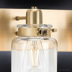 A gorgeous vintage lamp, part of the luxurious Bridgeport Collection by Urban Ambiance, featuring an Olde Brass finish and glass jar.
