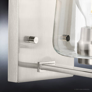 A beautiful and unique UHP4200 New Traditional Wall Sconce 8.5''H x 5''W with a glass shade, finished in brushed nickel, from the Swan-Hill