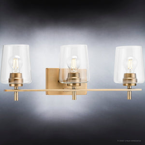 A gorgeous UHP4206 New Traditional Bath Light 8.5''H x 24.25''W, Olde Brass Finish, Swan-Hill Collection bathroom fixture with three clear glass shades
