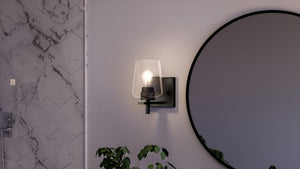 A unique and beautiful bathroom with a UHP4208 New Traditional Wall Sconce 8.5''H x 5''W, Midnight Black Finish, Swan-Hill Collection by Urban Amb