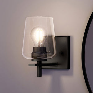 A beautiful Urban Ambiance UHP4208 New Traditional Wall Sconce in Midnight Black finish, from the luxurious Swan-Hill Collection.