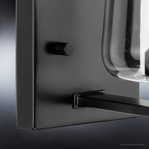 A unique lighting fixture, the UHP4208 New Traditional Wall Sconce 8.5''H x 5''W in a midnight black finish from the Swan-Hill Collection