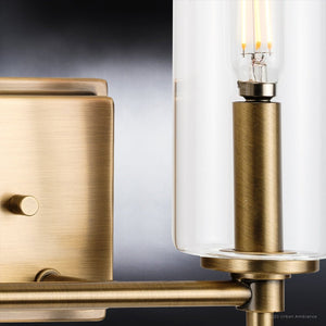 A beautiful Urban Ambiance UHP4225 Contemporary Bath Light 11.5''H x 12.5''W, Olde Brass Finish, Parkes Collection with a clear glass