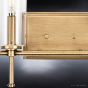 A gorgeous lighting fixture, the UHP4227 Contemporary Bath Light features an Olde Brass Finish and clear glass shade.