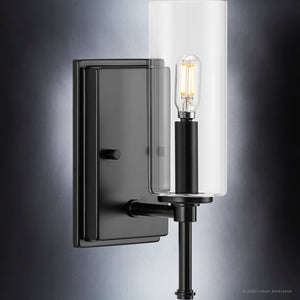 An UHP4228 Contemporary Wall Sconce with a clear glass bulb, Midnight Black Finish, Parkes Collection by Urban Ambiance featuring unique lighting fixture and luxury design.