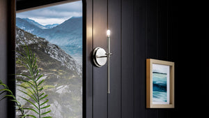 A beautiful room with a UHP4232 Contemporary Wall Sconce lighting fixture from the Parkes Collection by Urban Ambiance and a view of mountains.