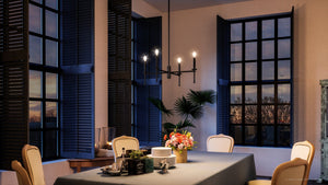 A dining room with a beautiful UHP4242 Contemporary Chandelier 10.375''H x 22.875''W, Midnight Black Finish, Parkes Collection from Urban Ambiance table and