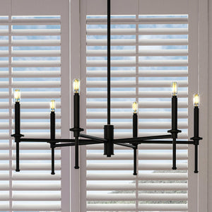 A unique Urban Ambiance UHP4243 Contemporary Chandelier 10.375''H x 30''W, Midnight Black Finish, Parkes Collection in front of a beautiful window with shutters