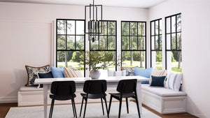 A beautiful dining room with a UHP4246 Contemporary Chandelier 31.375''H x 15''W, Midnight Black Finish, Parkes Collection from Urban Ambiance table and