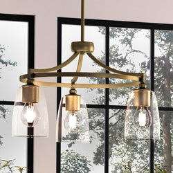 A beautiful Urban Ambiance UHP4250 Traditional Chandelier 12.25''H x 21''W with three glass shades hanging over a window.