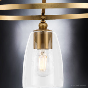 A gorgeous lighting fixture, the UHP4250 Traditional Chandelier by Urban Ambiance features a brushed bronze finish and clear glass bulb.