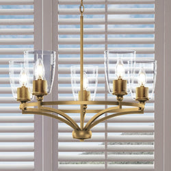 A beautiful and unique UHP4251 Traditional Chandelier with glass shades in front of a window. [Brand Name: Urban Ambiance]