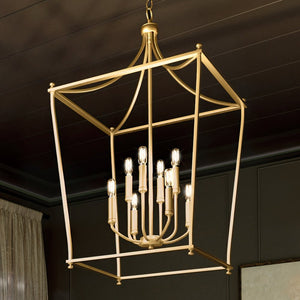 A Urban Ambiance UHP4259 Traditional Chandelier 36''H x 20''W, Brushed Bronze Finish, Coronado Collection hanging in a room, creating a beautiful ambiance.