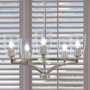 A gorgeous Urban Ambiance UHP4262 Tranditional Chandelier with four glass shades hanging over a window