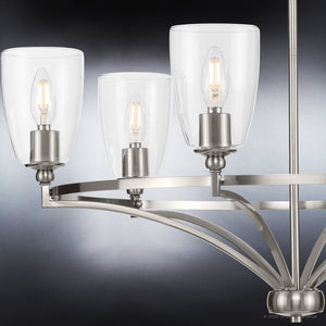 Four unique UHP4263 Traditional Chandeliers with clear glass shades.