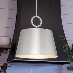 A beautiful UHP4264 New Traditional Pendant 11.875''H x 12.375''W, Brushed Nickel Finish, Coronado Collection by Urban Ambiance hanging over a kitchen island