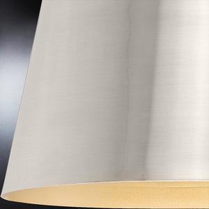 A unique lighting fixture featuring a close up image of a UHP4264 New Traditional Pendant 11.875''H x 12.375''W, Brushed Nickel Finish, Coronado Collection