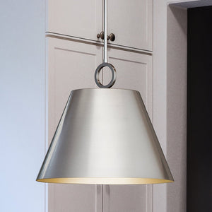 A luxurious pendant light hanging over a kitchen island.
