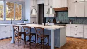 A kitchen with a center island and stools featuring the UHP4265 New Traditional Pendant 15.25''H x 17.875''W, Brushed Nickel Finish from the Coronado Collection