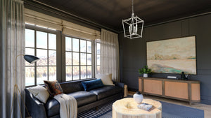 A living room with black walls and gorgeous lighting fixture, Urban Ambiance's UHP4269 Traditional Chandelier.