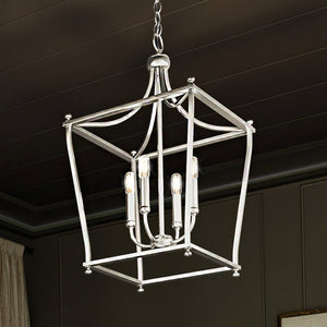 A beautiful Coronado Collection lamp with a brushed nickel finish and three lights hanging from the ceiling.