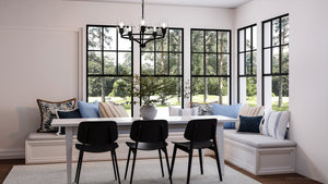 A dining room with large windows and a unique UHP4273 Tranditional Chandelier 12.5''H x 25.25''W, Midnight Black Finish, Coronado Collection by