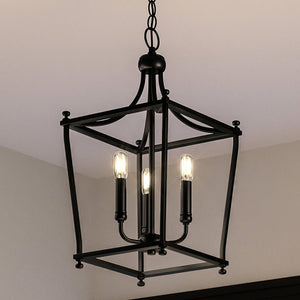 A unique and luxurious UHP4279 Tranditional Chandelier with a Midnight Black Finish, Coronado Collection pendant light hanging over a dining room table by Urban Ambiance.