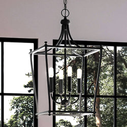 A unique and beautiful UHP4280 Traditional Chandelier 24.375''H x 14.375''W, Midnight Black Finish, Coronado Collection hanging over a window in a