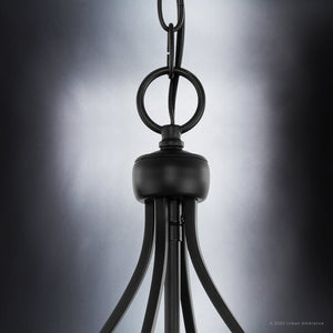 An UHP4281 Tranditional Chandelier 36''H x 20''W, Midnight Black Finish, Coronado Collection by Urban Ambiance hanging on a black background and showcasing its beautiful