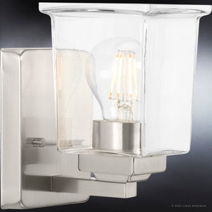 A beautiful lighting fixture, the UHP4290 Craftsman Wall Sconce from the Houston Collection by Urban Ambiance, features a brushed nickel finish and clear glass bulb.