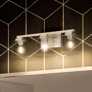 A luxury bathroom with an UHP4292 Craftsman Bath Light 7''H x 20.125''W, Brushed Nickel Finish lighting fixture.