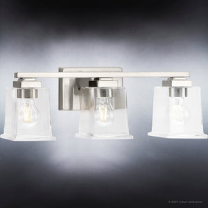 Three unique Craftsman Bath Lights with clear glass bulbs.