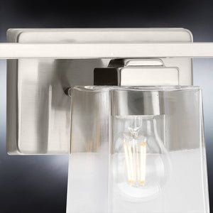 A beautiful Urban Ambiance UHP4292 Craftsman Bath Light with a brushed nickel finish and a clear glass shade.