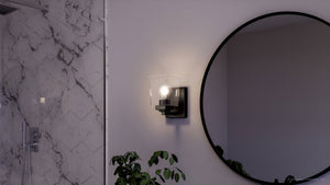 A bathroom with a UHP4294 Craftsman Wall Sconce 7''H x 4.5''W, Midnight Black Finish, Houston Collection by Urban Ambiance lighting fixture and a