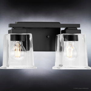 A beautiful and unique UHP4295 Craftsman Bath Light 7''H x 12.25''W, Midnight Black Finish, Houston Collection bathroom fixture with two light bulbs and a