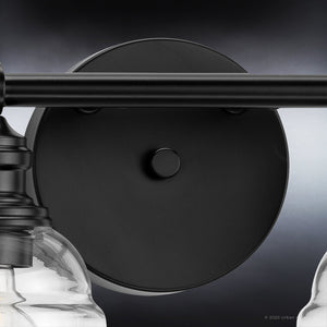 A beautiful UHP4307 Vintage Bath Light 7.875''H x 29''W, Midnight Black Finish, Phoenix Collection fixture with two clear glass bulbs from Urban Ambiance.