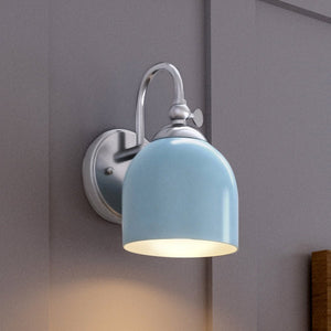 A gorgeous UHP4310 Vintage Wall Sconce 9''H x 5.5''W with a blue shade hanging on a wall, Urban Ambiance Jacksonville Collection.