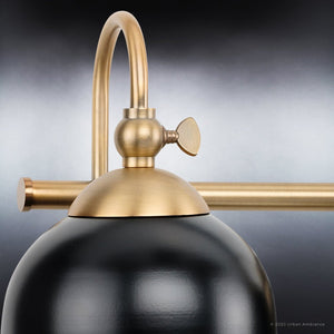 A gorgeous Vinatge Bath Light 9''H x 24''W, Olde Brass Finish, Jacksonville Collection lamp with a black ball on it.