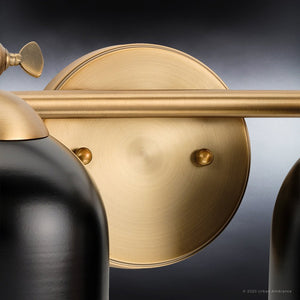 A beautiful Urban Ambiance lighting fixture with two UHP4317 Vintage Bath Lights 9''H x 33''W, Olde Brass Finish in the luxurious Jacksonville Collection.