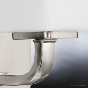 A beautiful lighting fixture from the Louisville Collection, featuring a brushed nickel finish and a white shade.