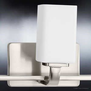 Gorgeous and contemporary Brushed Nickel bath light with a square glass shade.