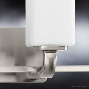A beautiful and unique Urban Ambiance UHP4323 Contemporary Bath Light with a white glass shade.