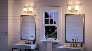 An Urban Ambiance bathroom with two beautiful UHP4325 Contemporary Bath Lights 8.5''H x 13.5''W, Satin Gold Finish, Louisville Collection sinks and a window