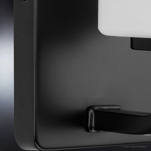 A luxury lighting fixture, the UHP4328 Contemporary Wall Sconce from the Louisville Collection, features a unique design with a Midnight Black finish and measures 8.5''H x 4